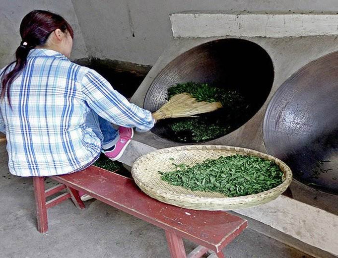 Frying Lu An Gua Pian Tea Leaves