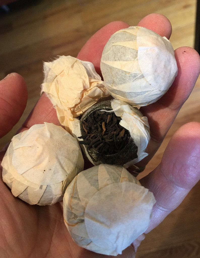 Tangerine Pu'er..."Xiao Qing Gan"...Small Green Tangerine Pu'er tea with a refreshing nuance of tangerine...and LOTS of health benefits...Puerh - Drink Great Tea